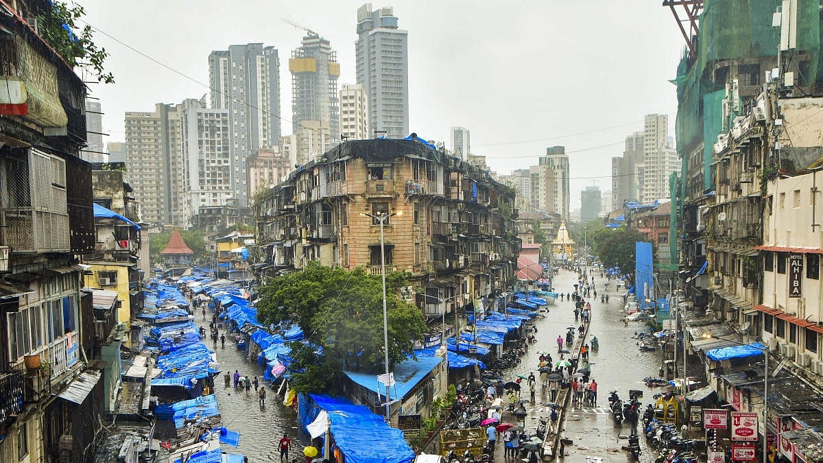 Mumbai rainfall breaks 100-year record, inundating roads and areas