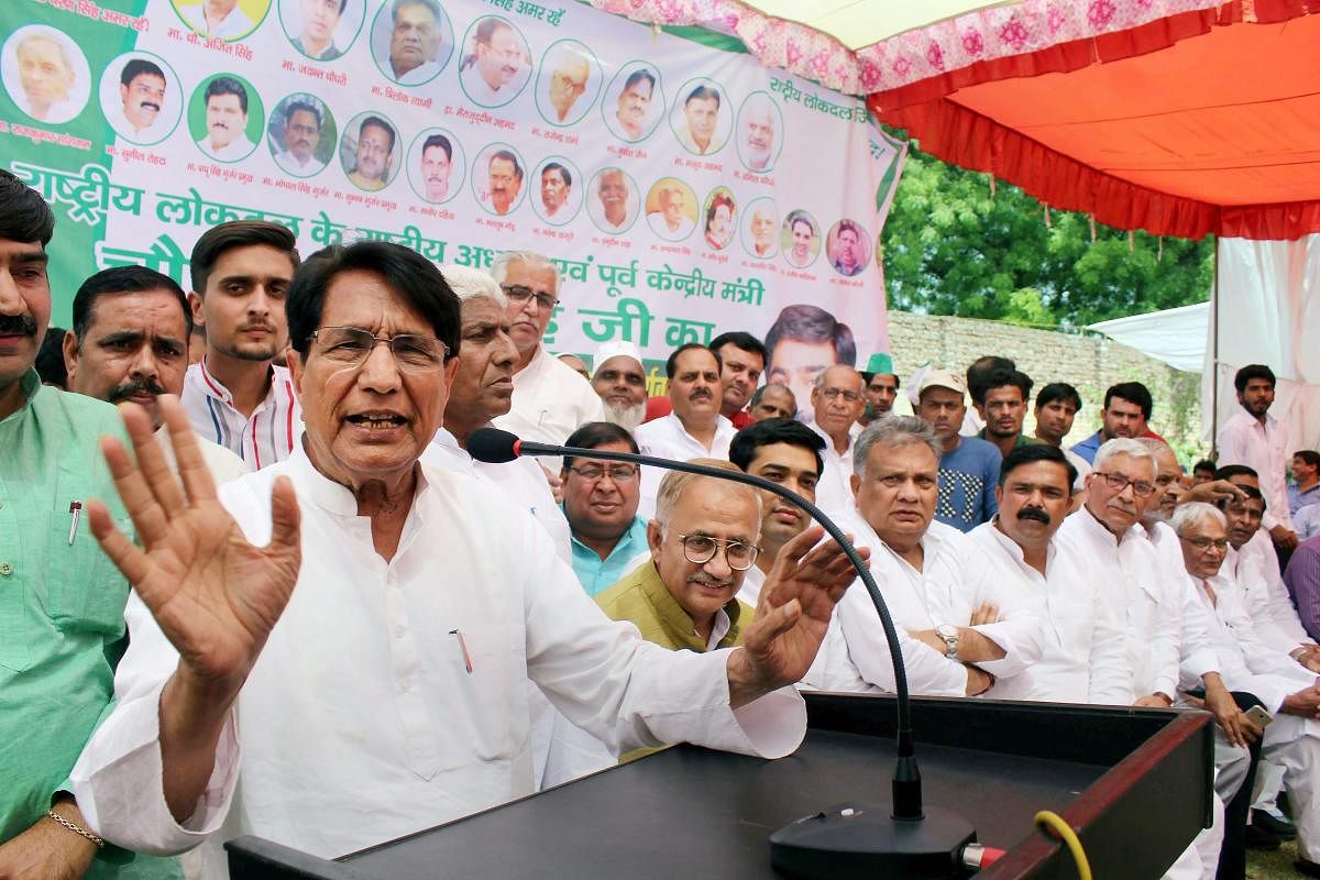 RLD chief Ajit Singh addresses a programme in Meerut on Sunday. PTI