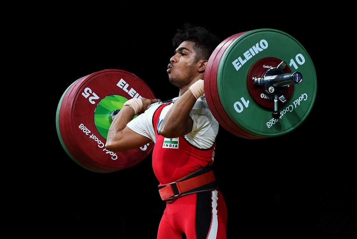 India's M Raja competes in men's 62 kg weightlifting event at 2018 Commonwealth Games in Gold Coast, Australia on Thursday. (PTI Photo)