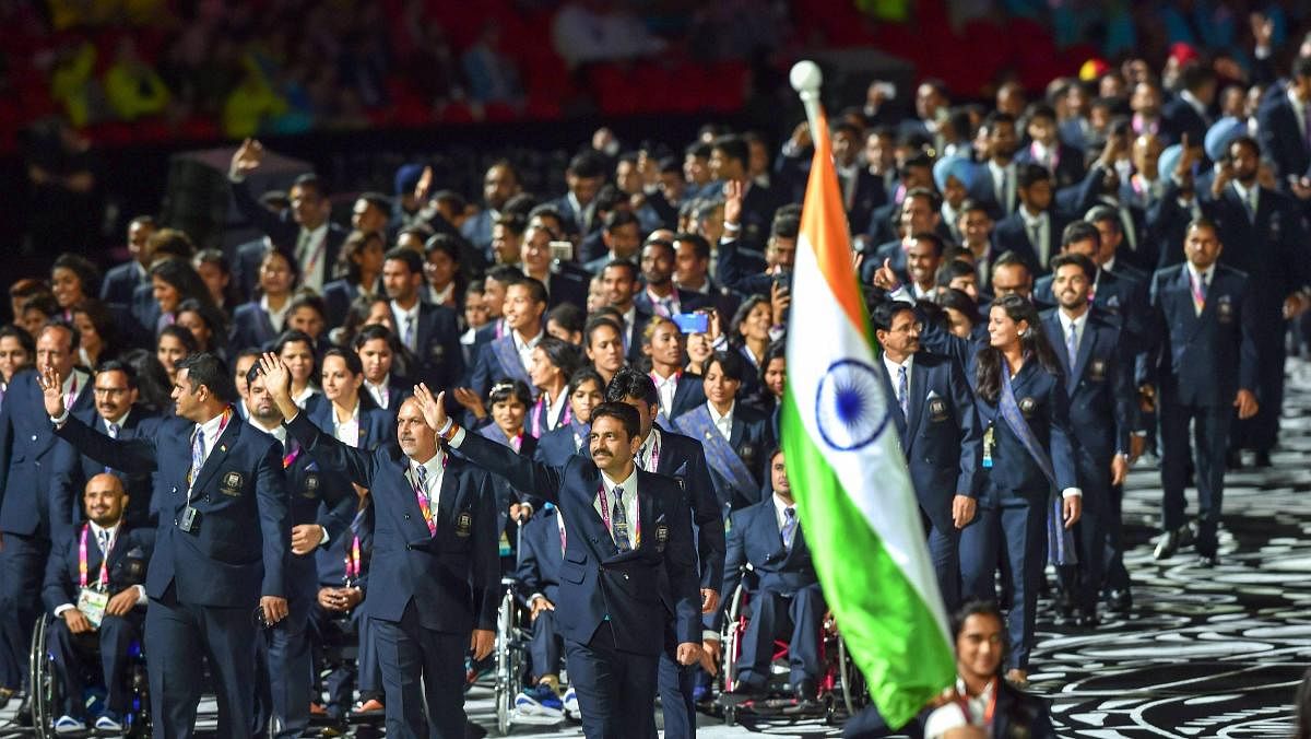 Flagbearer PV Sindhu leads the Indian contingent at Carrara Stadium during the opening ceremony of 2018 Commonwealth Games, Gold Coast in Australia on Wednesday. (PTI Photo)