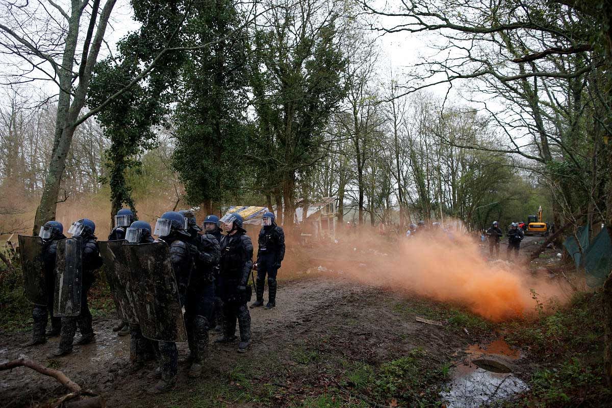 French gendarmes secure a road during clashes with protesters during an evacuation operation in the zoned ZAD (Deferred Development Zone) in Notre-Dame-des-Landes, near Nantes, France. Reuters Photo