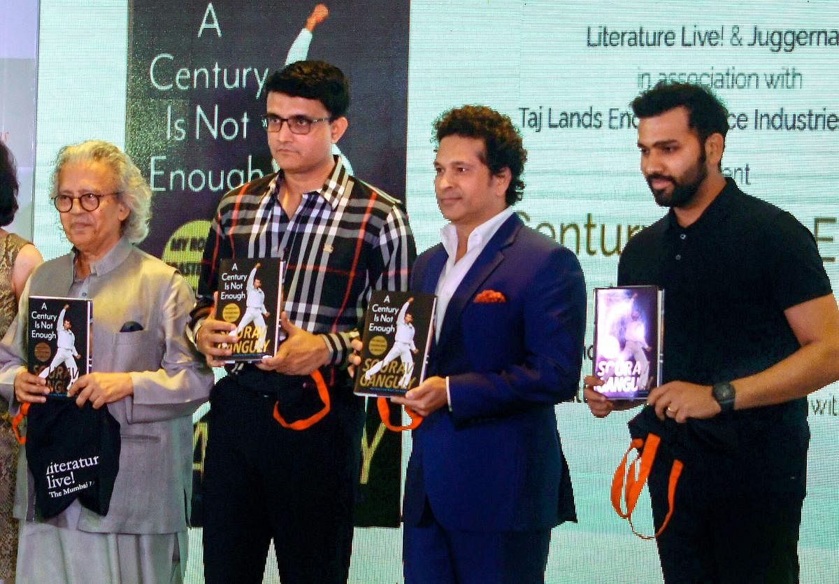 Journalist Anil Dharker, Sourav Ganguly, Sachin Tendulkar and Rohit Sharma during the launch of Ganguly's book, 'A Century Is Not Enough', in Mumbai on Wednesday. (PTI Photo)