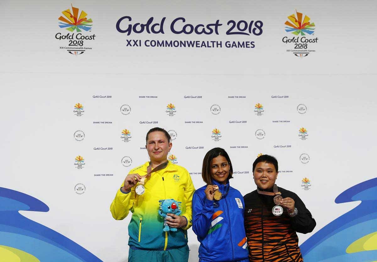 Gold medalist Heena Sidhu of India, silver medalist Elena Galiabovitch of Australia and bronze medalist Alia Sazana Azahari of Malaysia on the podium. Reuters Photo