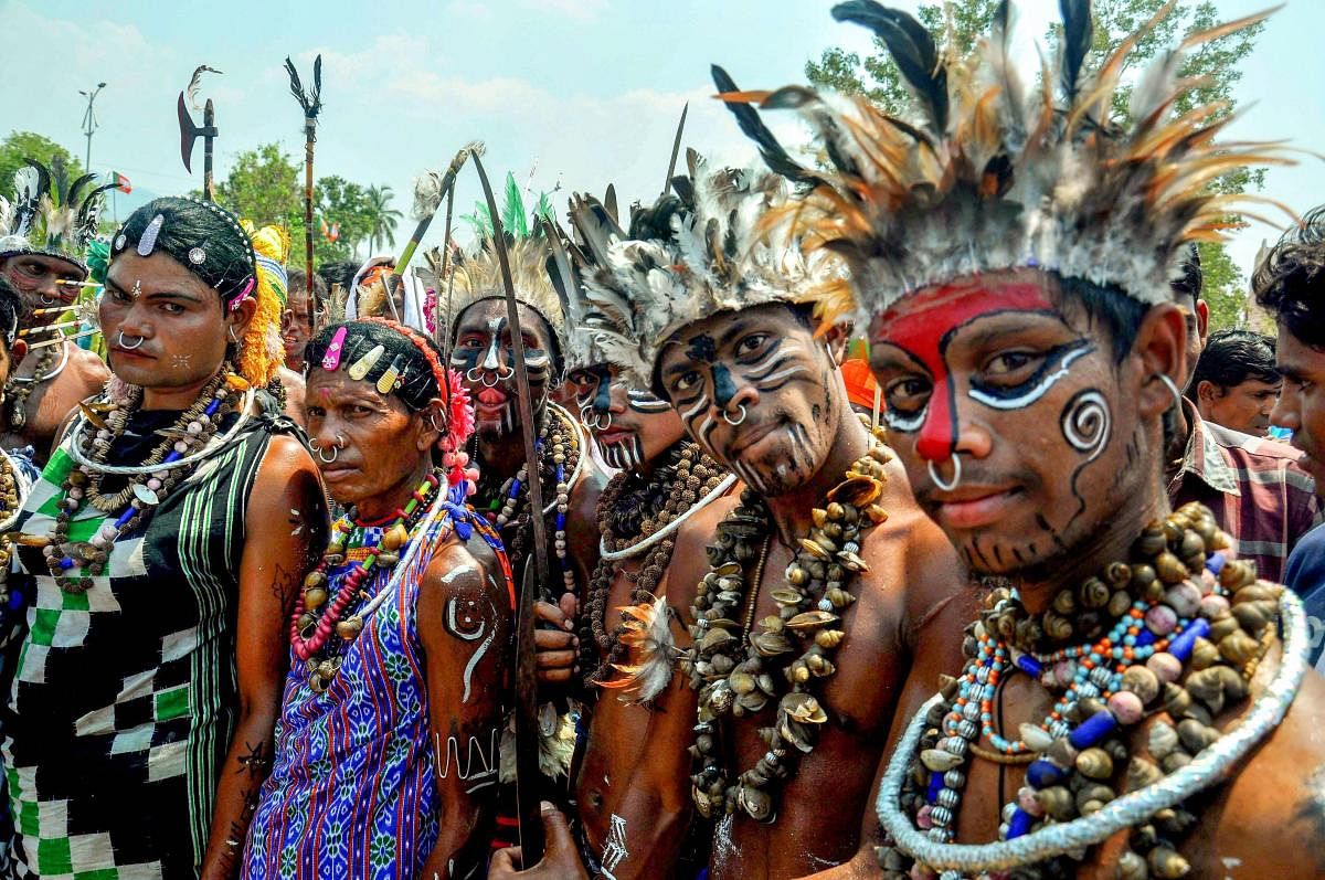 Tribes during BJP president Amit Shah's public meeting in Bhawanipatna in Odisha on Wednesday. (PTI Photo)
