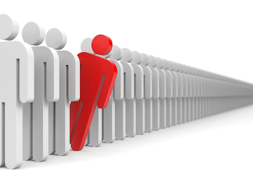 The red individual is not following the social norm. 