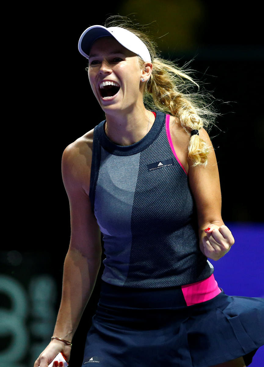 Flawless Wozniacki eases into second round