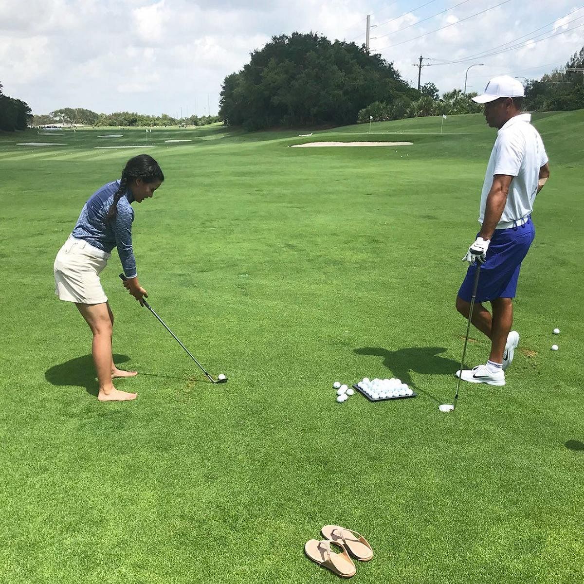 Nepali teen gets golf lesson from Woods