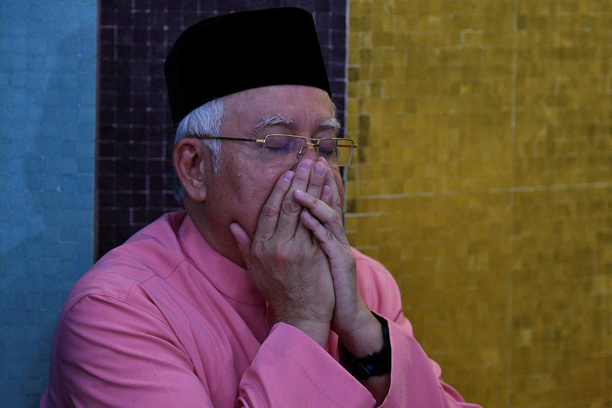 Police search scandal-tainted Malaysian ex-premier's home