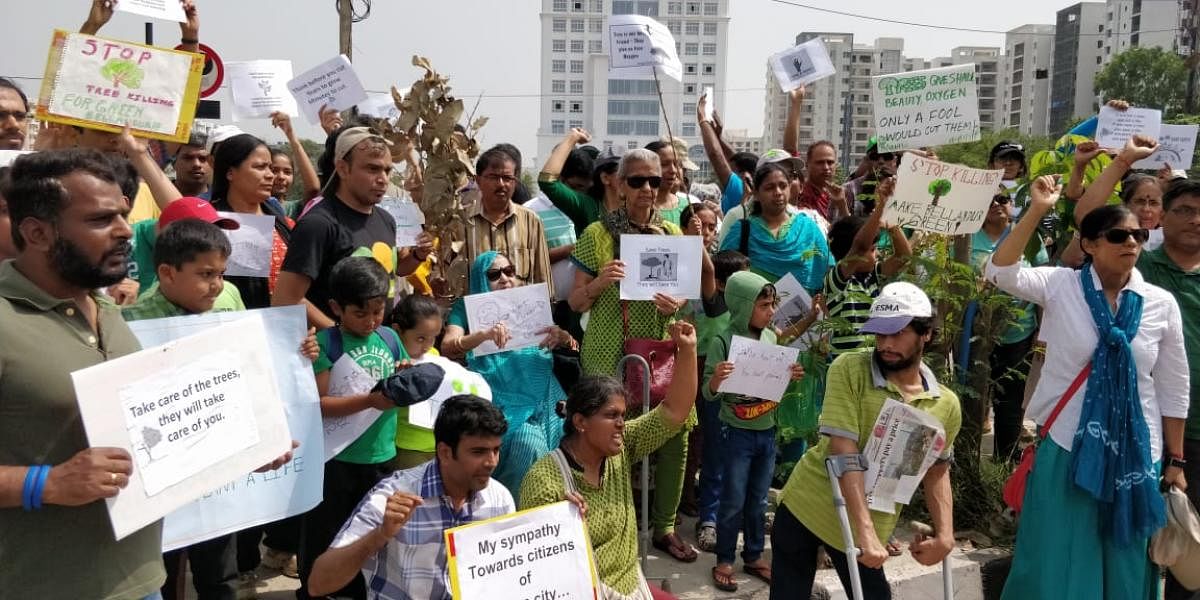 City residents protest against trees chopped for hoardings
