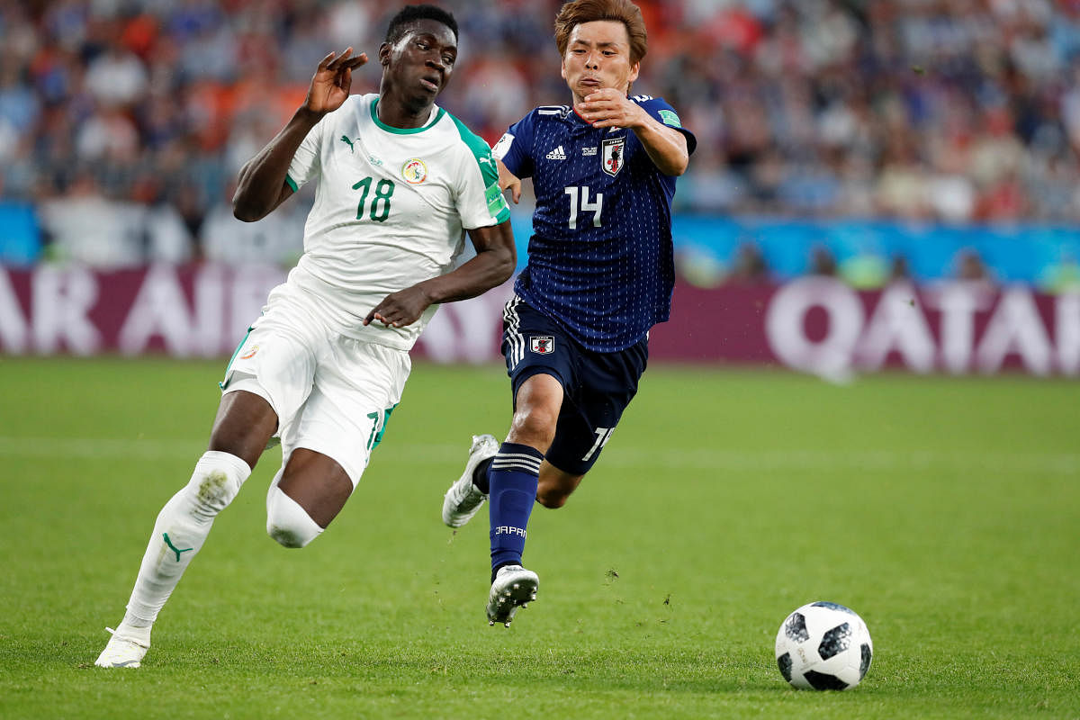 Japan-Senegal draw keeps teams' last-16 hopes alive