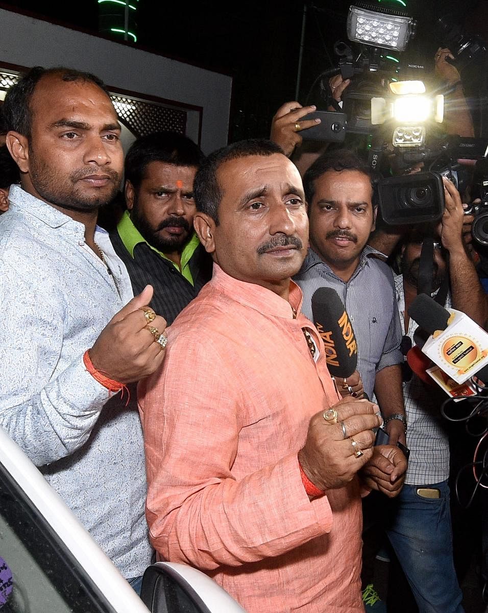 BJP MLA from Unnao Kuldeep Singh Sengar, accused in a rape case, outside the office of theSenior Superintendent of Police in Lucknow on Wednesday night. (PTI Photo)