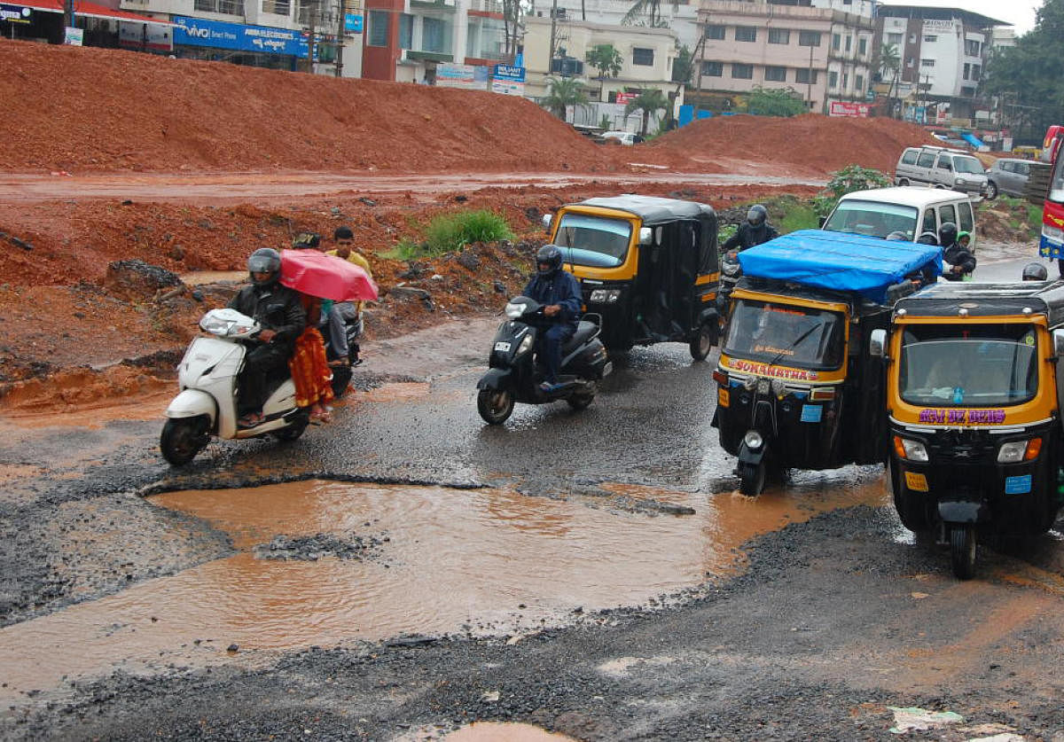 Roads riddled with potholes in Mangaluru