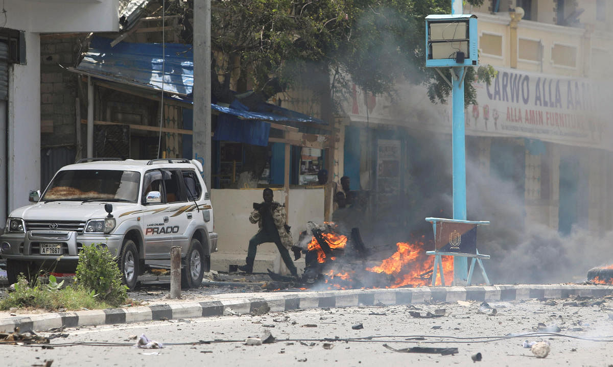 At least 9 dead in ongoing attack on Somali ministry
