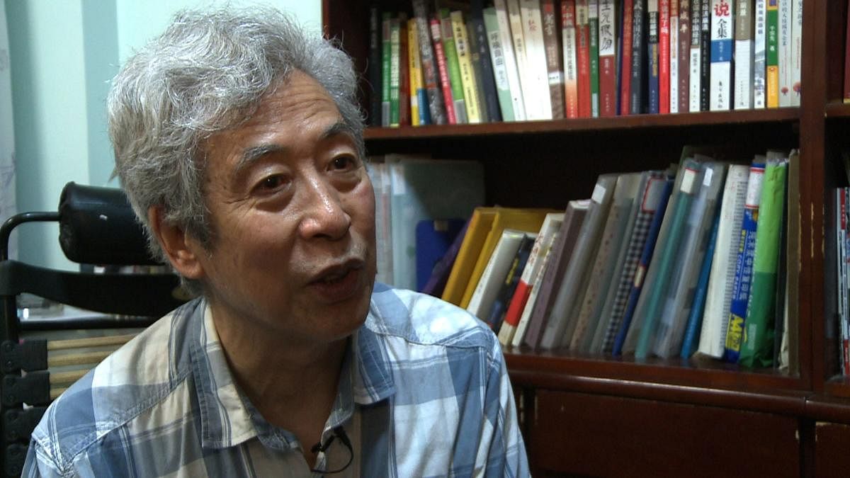 China critic silenced during live TV interview