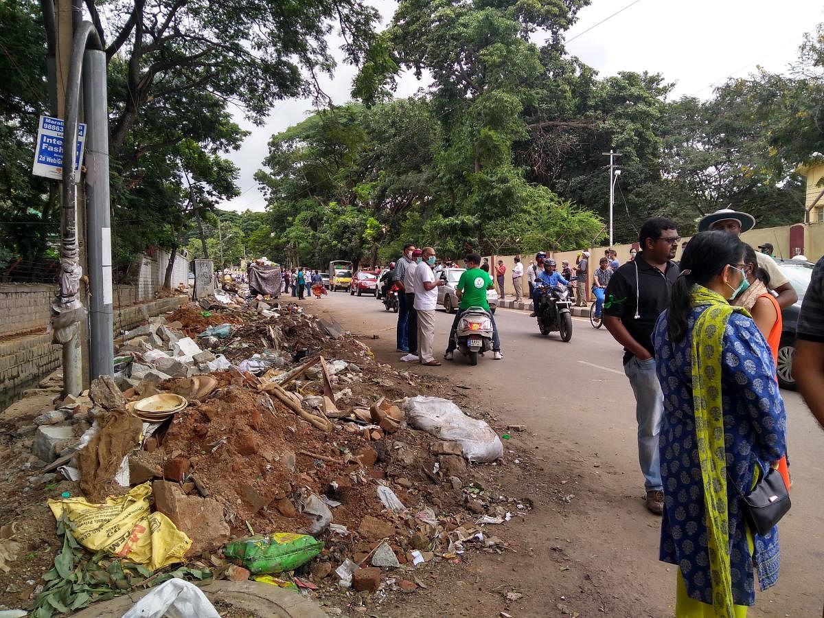 Garbage sorting yard at main road leaves area in a mess