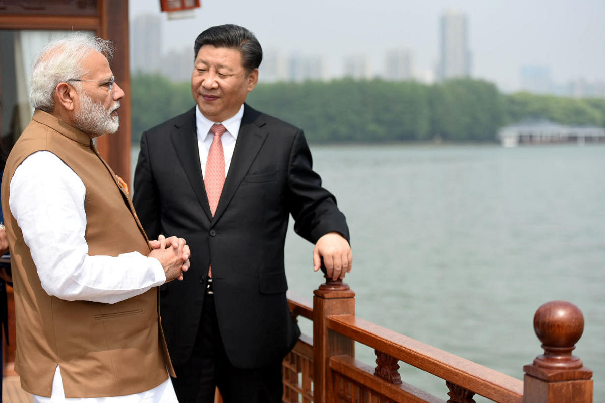 China, India must be sensitive to each other's interests