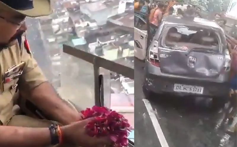 Kanwars thrash, overturn car; police drop flowers