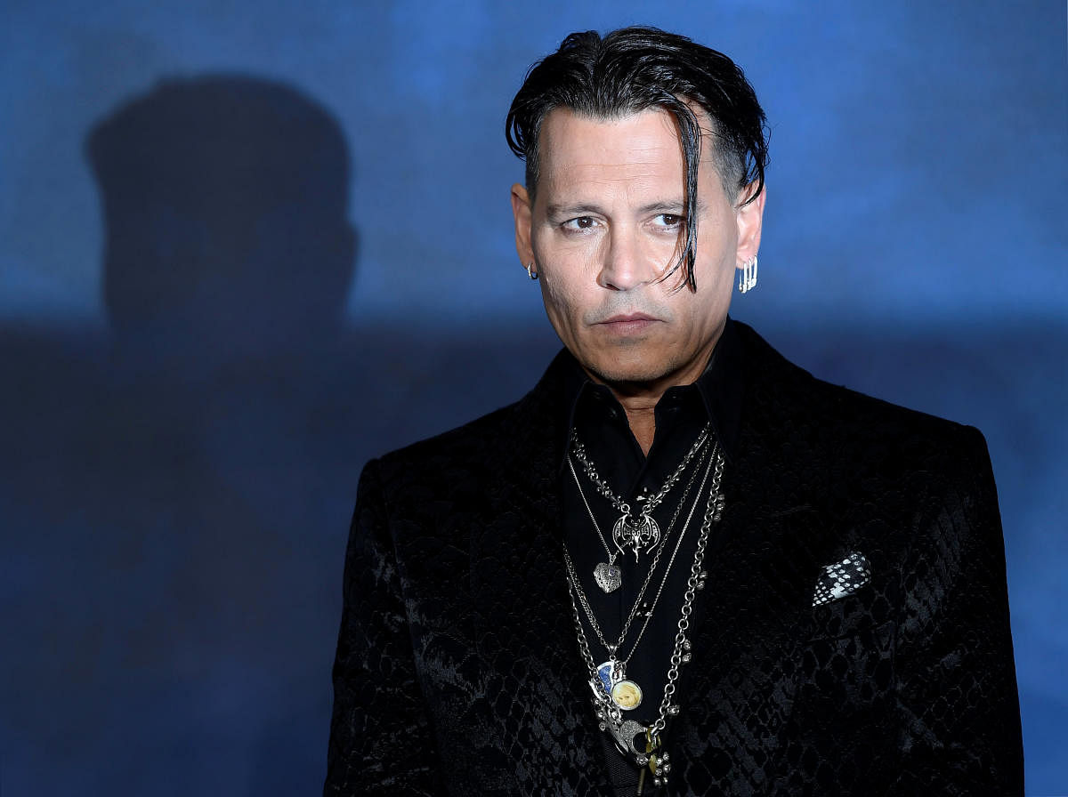Erza comments on Depp's casting in 'Fantastic Beasts'