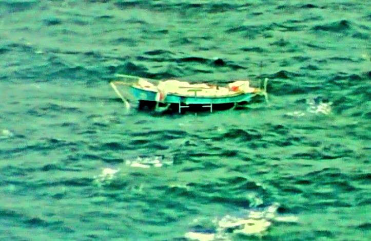 The capsized yacht 'Thuriya' is pictured at sea in this handout photo released by the Indian Navy on Monday. (Image/ Indian Navy)