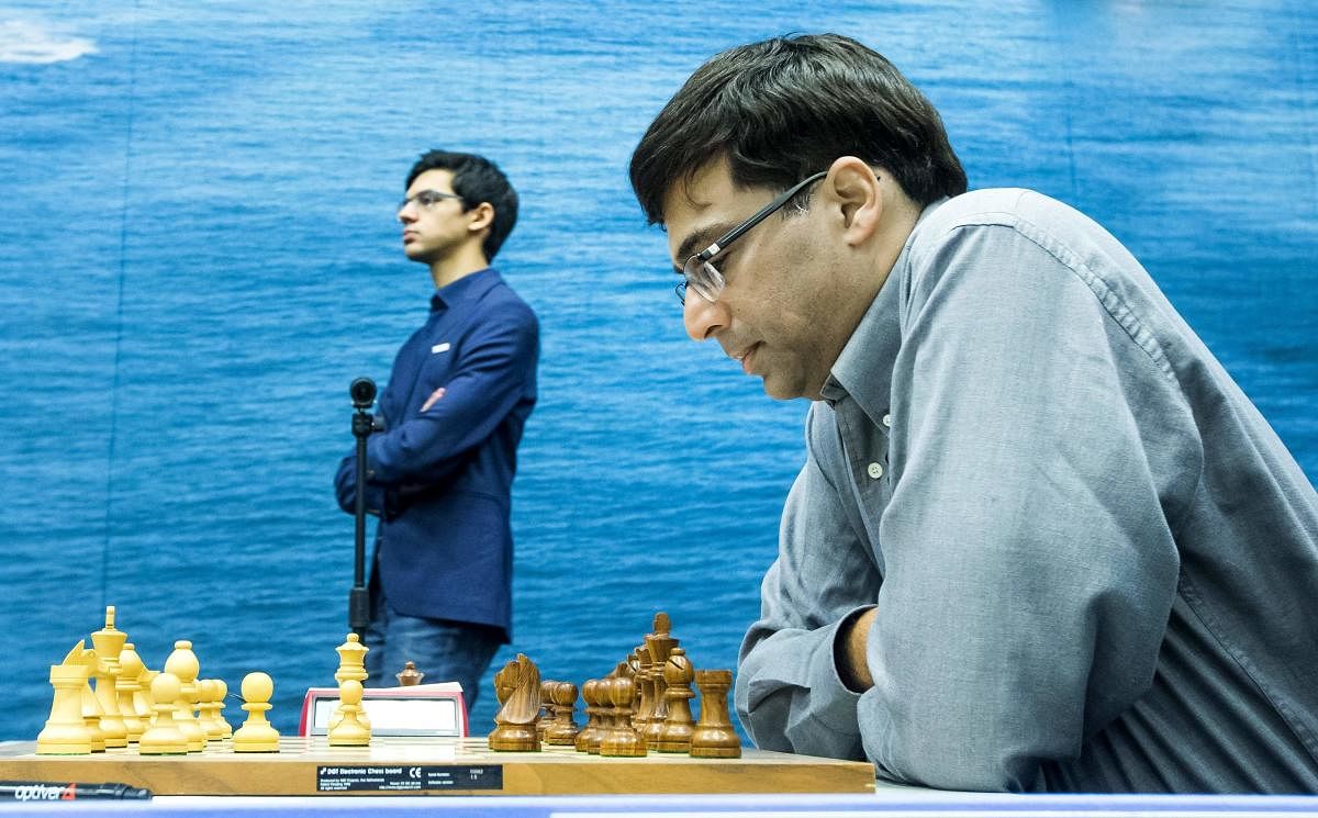 Anand draws with Rapport to stay in joint lead