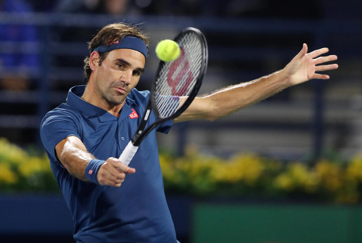 Federer starts 100th title bid with win in Dubai