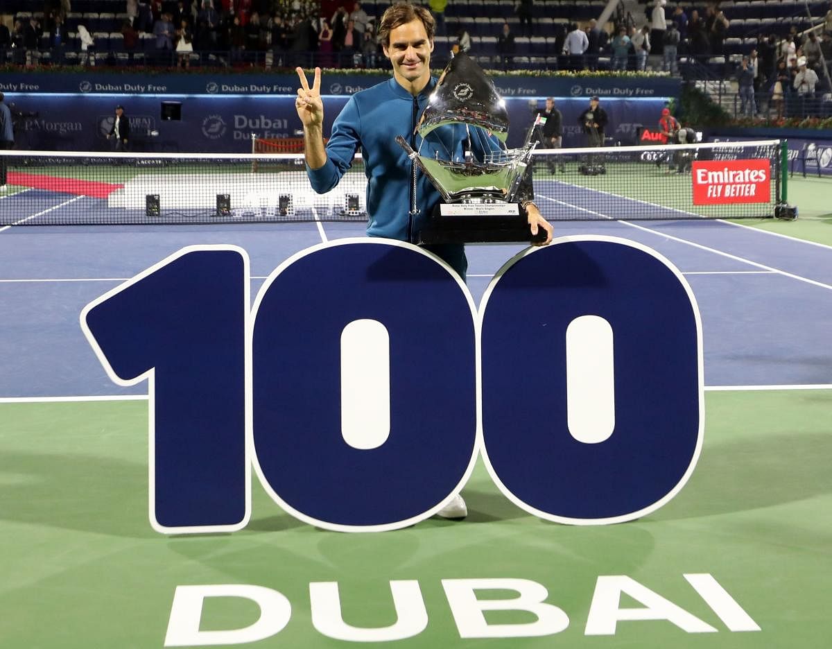 Federer stands tall with his 100th title