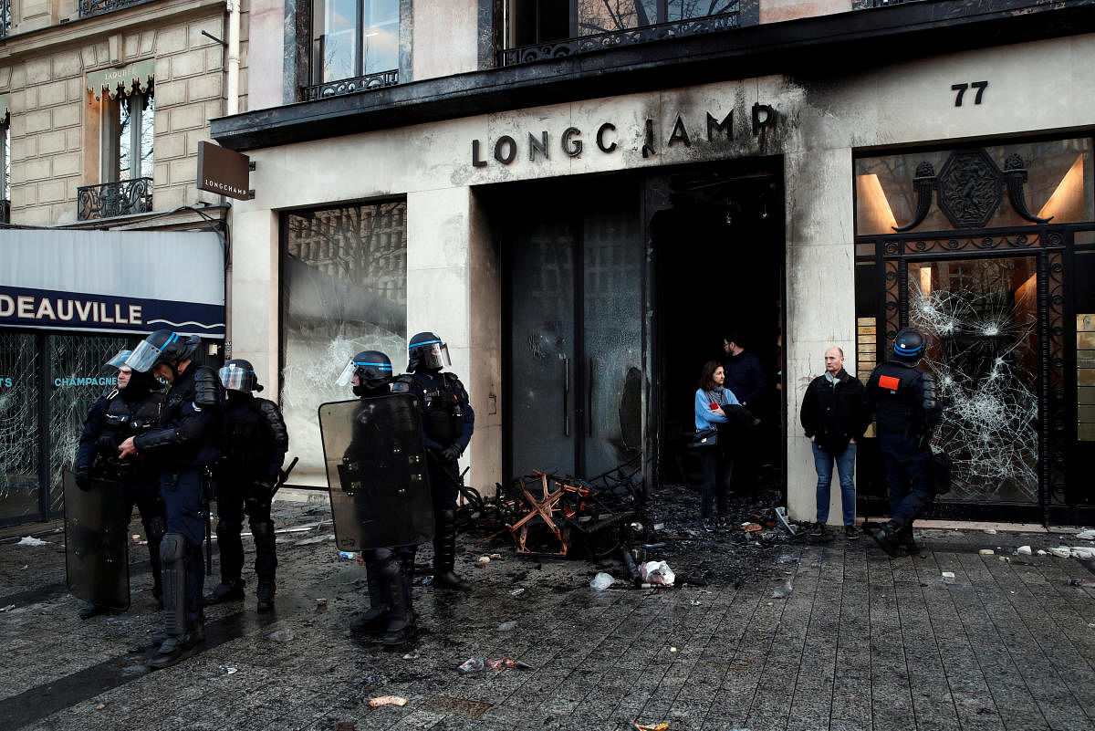 Paris luxury stores looted, burned in yellow vest riots