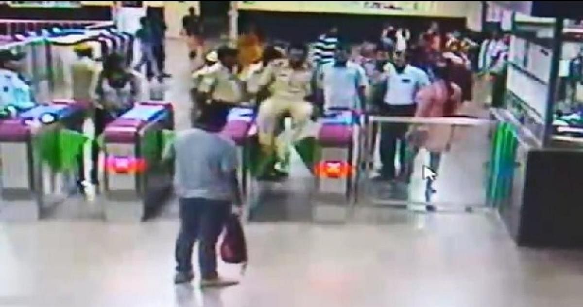 Sub-inspector jumps metro fare gates in show of 'power'