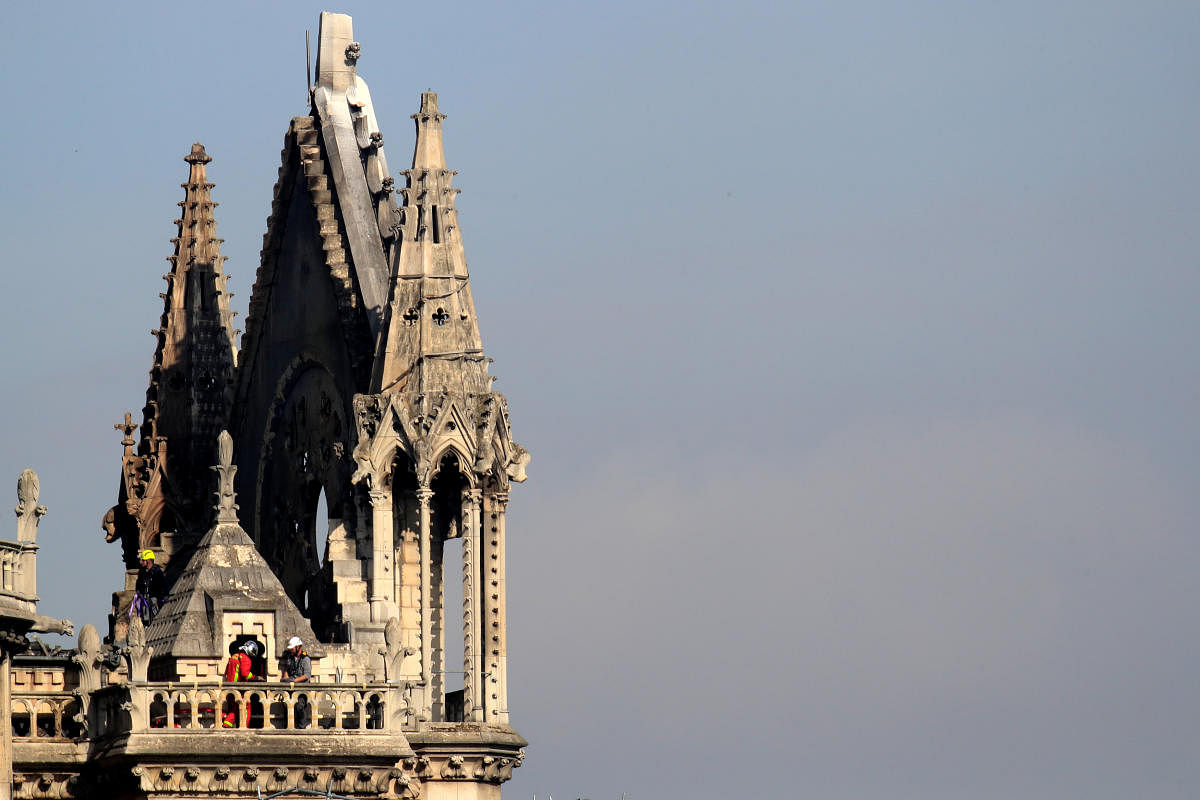 Notre-Dame: Rooster statue found 'battered' in debris