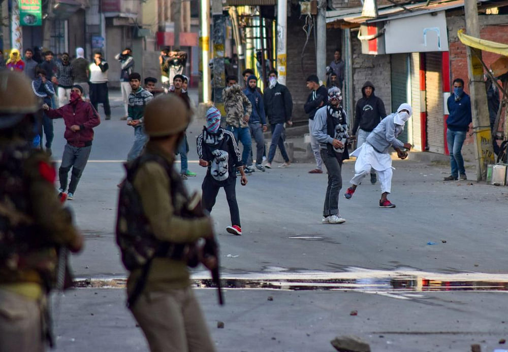 Three injured as forces fire pellets on protesters