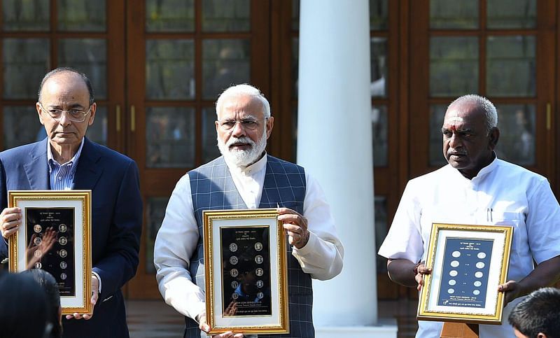 PM launches visually impaired-friendly Rs 20 coins