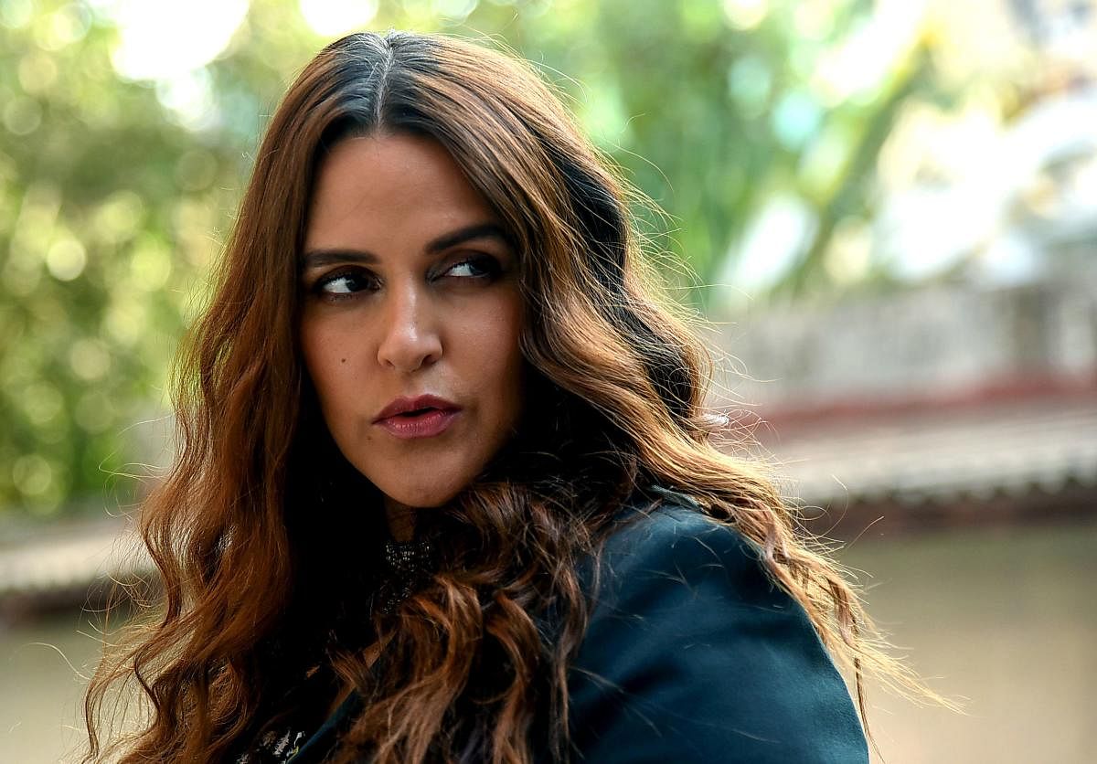 Don't believe in showmanship of a child: Neha Dhupia