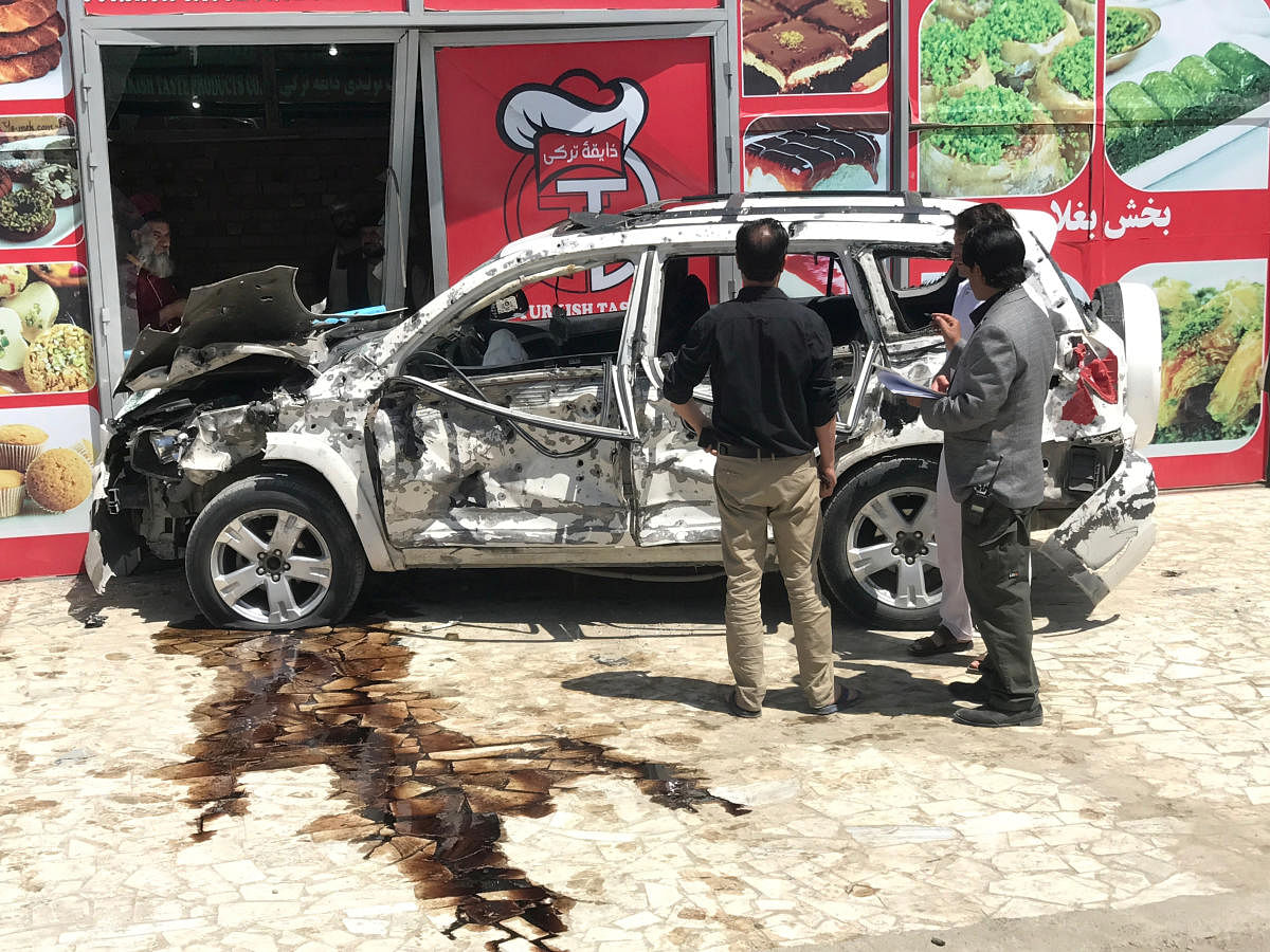 Four Afghans killed, four US troops wounded in Kabul 
