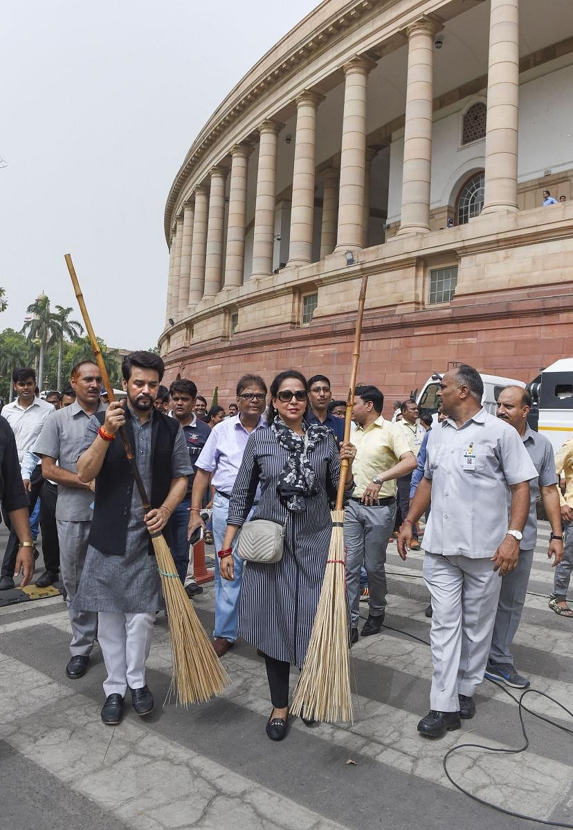 MPs pick up broom for 'Clean India' kick off row