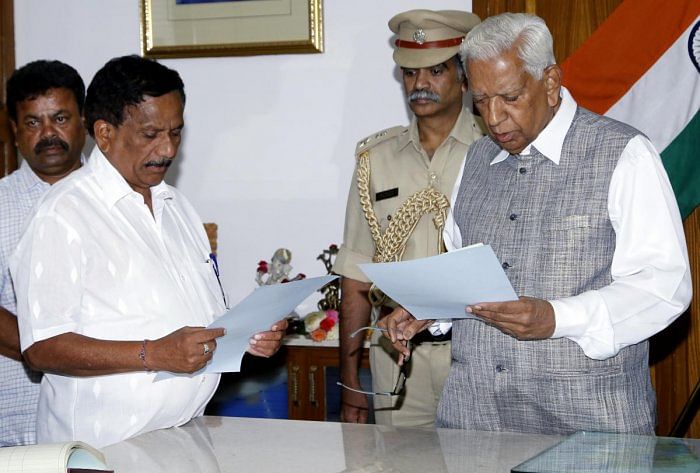 Governor Vajubhai Vala appointed Bopaiah, a four-term MLA as the pro-tem Speaker of the 15thAssembly to preside over the proceedings of oath-taking of newly elected members andsubsequently a floor test on May 18, 2018, in the House. (DH Photo)