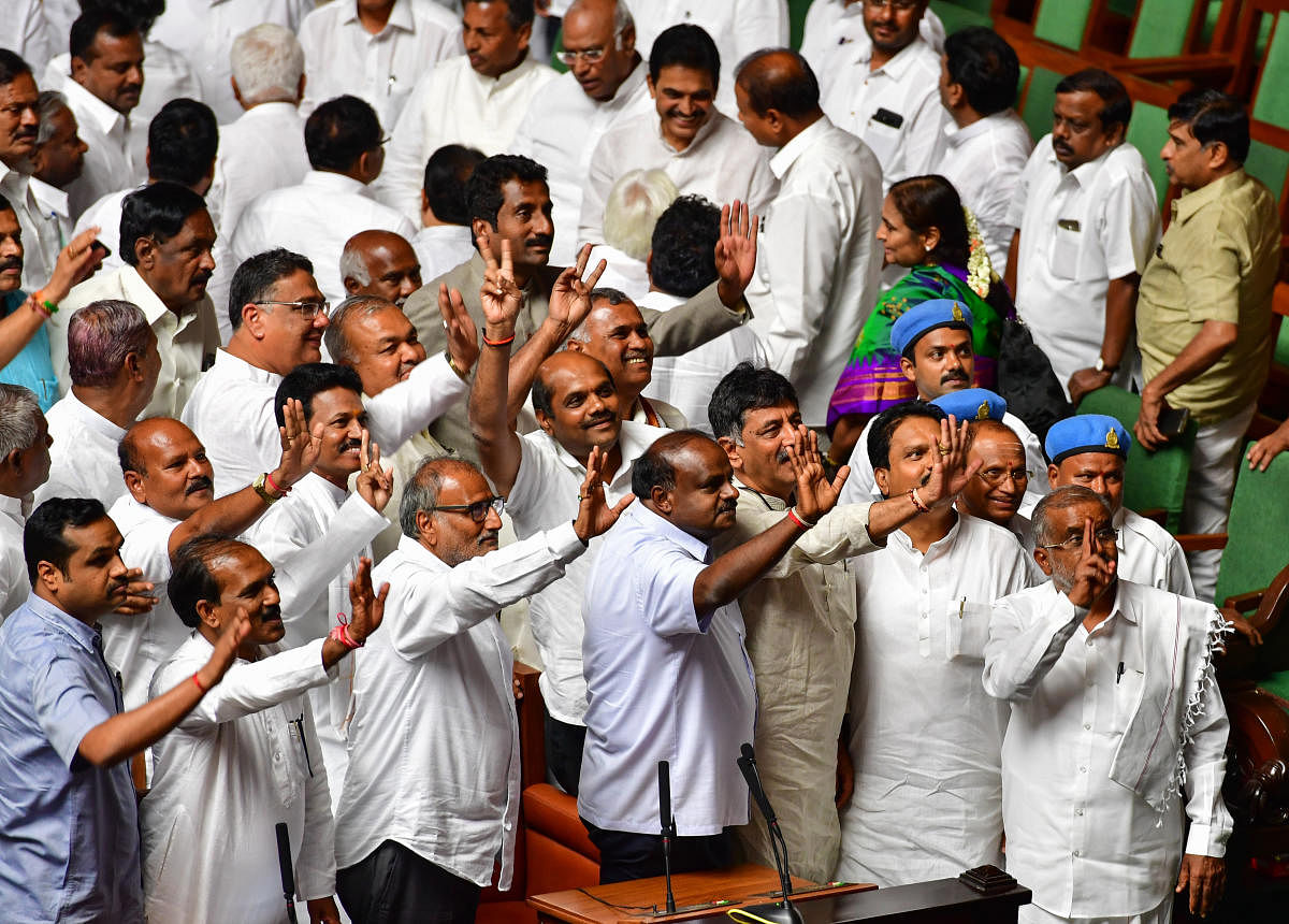 Chief Minister Kumaraswamy and DK Shivakumar and the ruling party, after the JDS-Congress coalitiongovernment had declared a majority in the Assembly on May 25, 2018. (DH File Photo)
