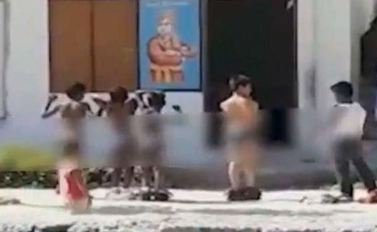AP school loses recognition for parading students nude