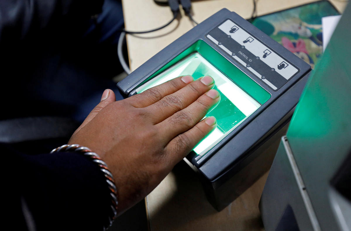 Aadhaar staffer booked for using own fingerprint