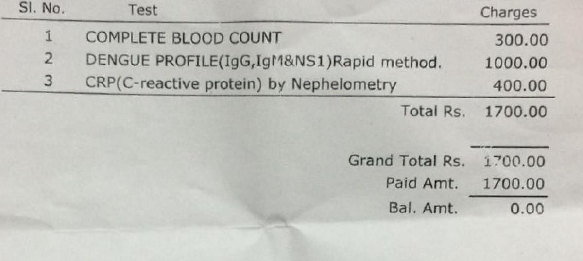 A receipt for Rs 1,000 for dengue test at a lab in Bengaluru.