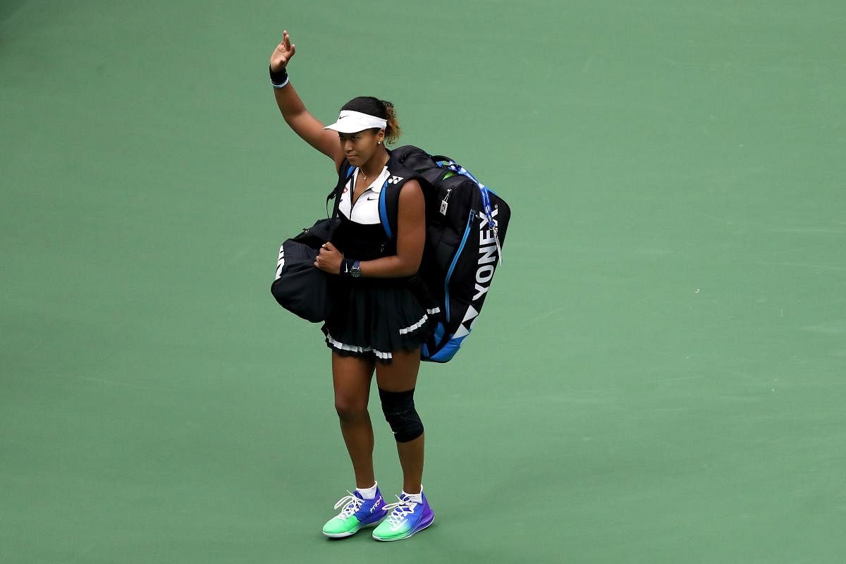 Defending champ Osaka knocked out by Bencic