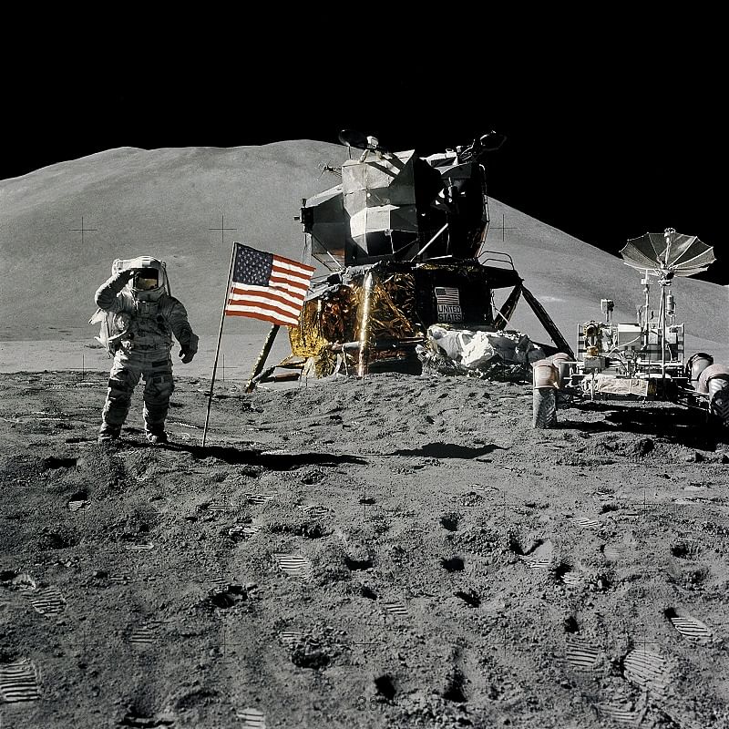 Irwin salutes the American flag while standing beside the Lunar Module and rover. (Photo: NASA)