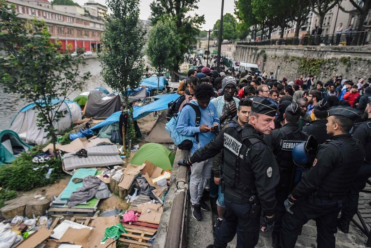 French police clear migrant camp in Paris