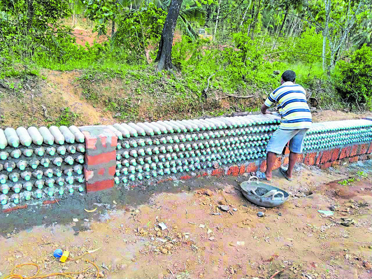 Plastic water bottles used to build compound wall