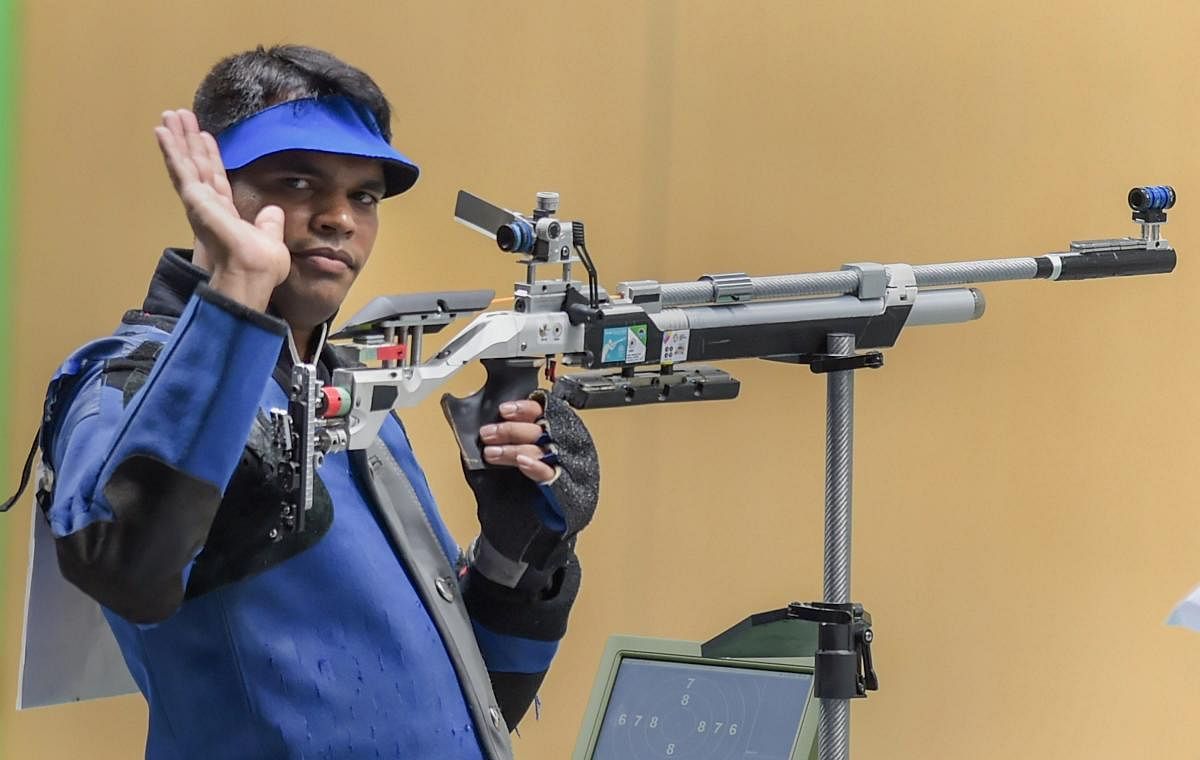 Shooter Deepak Kumar bags bronze and Olympic quota