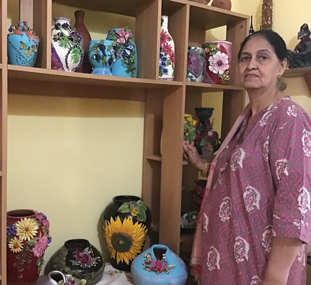 Hobby artist makes ceramic flower art