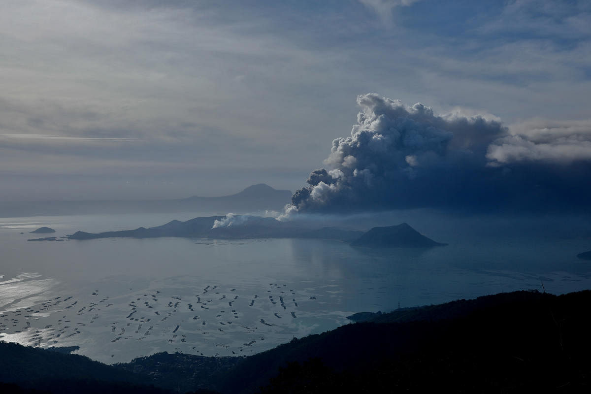 Philippines struggles to keep evacuees away from volcano