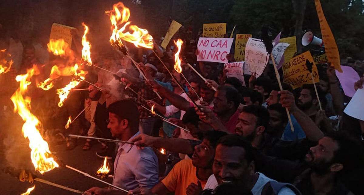 UoM students stage torchlight protest against CAA