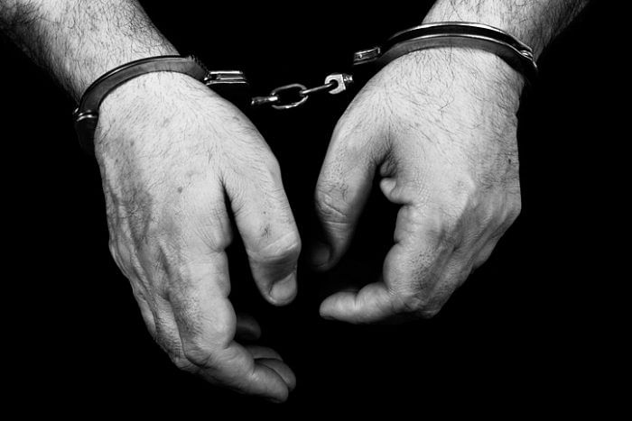 Man booked for abusing, manhandling policeman