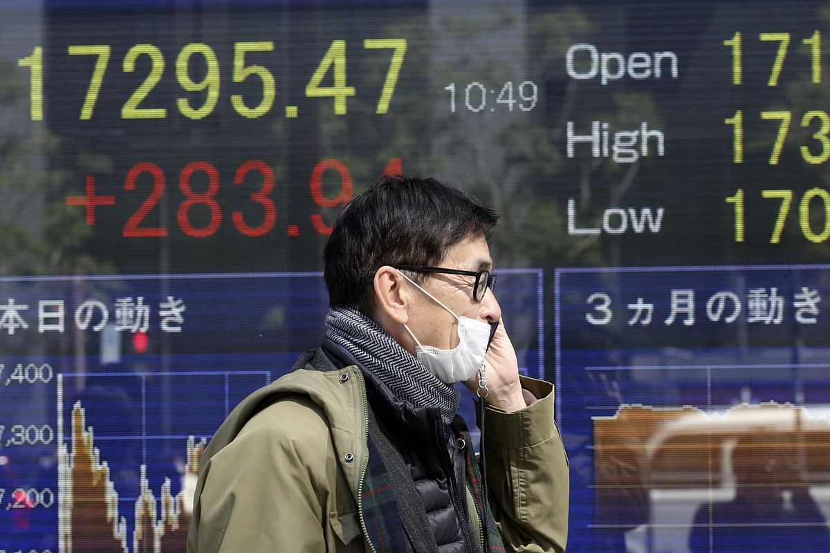 Asia shares suffer virus chills, central banks offer what they can