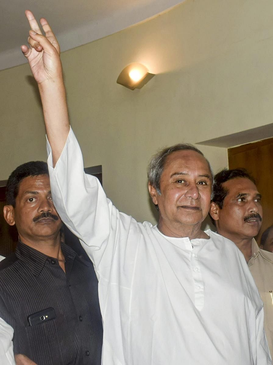 Bhubaneswar: BJD President and Odisha Chief minister Naveen Patnaik flashes the victory sign after party's victory in Odisha assembly and Lok Sabha elections, in Bhubaneswar, Thursday, May 23, 2019. (PTI Photo)